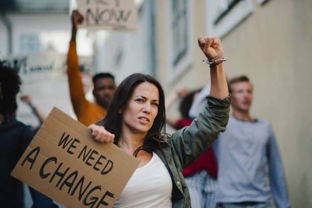 istock Group of people activists protesting on streets, strike and demonstration concept. 1282381276
