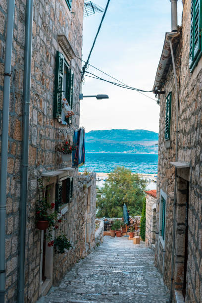 Narrow old street in Sutivan town, Brac, Croatia.