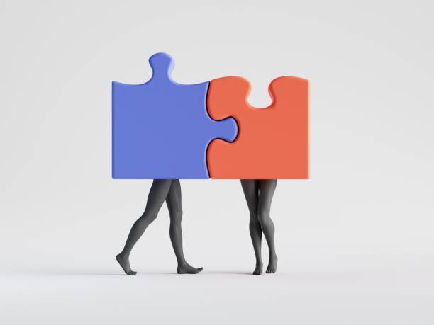 istock 3d render. Couple in love, abstract puzzle pieces with mannequin legs attached together. Partnership metaphor. Family relations social role play. Minimal clip art isolated on white background 1282382537