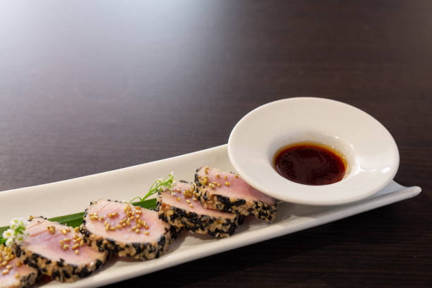 istock Tataki of tuna on a white plate 1282383552
