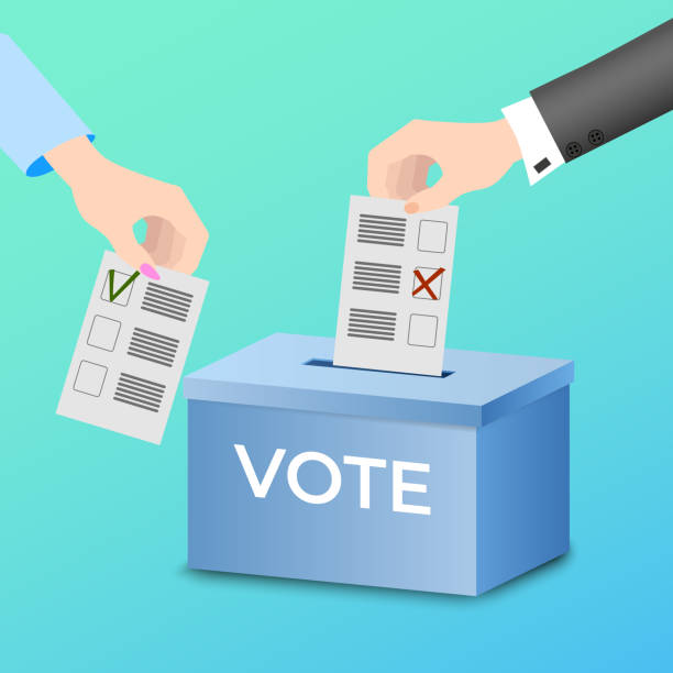istock People put their ballots in the ballot box 1282387309