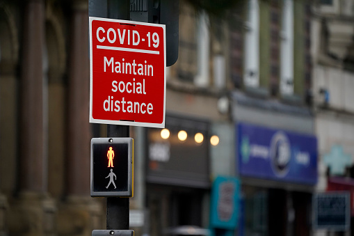 Coronavirus sign encouraging social distancing