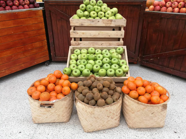 Fresh fruits. Kiwi, mandarin and apple.