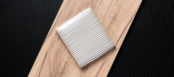 istock a new square white car air filter for cabin flat lay on dark background 1282398282