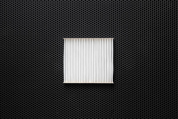 istock a new square white car air filter for cabin flat lay on dark background 1282398284