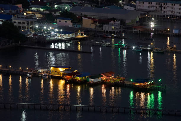 istock Colorful aquaculture village at night 1282404819