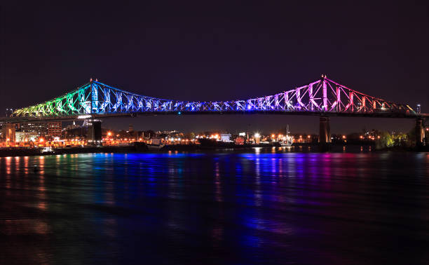 istock Jacques Cartier Bridge illuminated at night in Montreal, Canada 1282405545