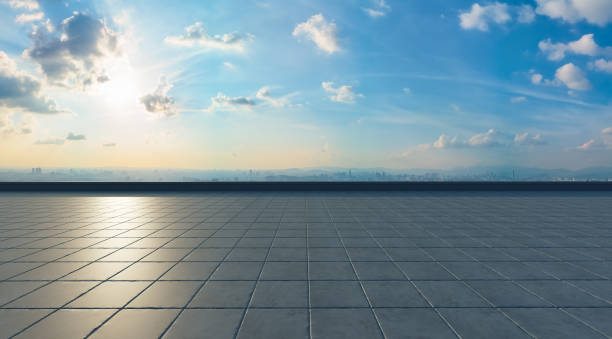 istock Empty concrete tiles floor with city 1282415079