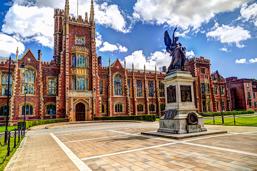Belfast, Northern Ireland - July 19, 2019: Main entrance and courtyard of Queen's University in Belfast Ireland.