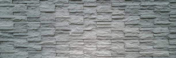 istock Gray brick wall background or Grunge wall vintage textures 1282419588
