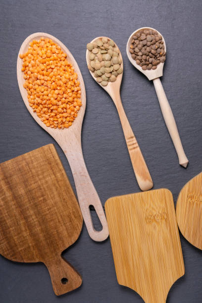 istock red, green, red lentils culinary top view. Selective focus. vertical photo 1282419640
