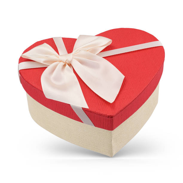 istock Heart shaped gift box with red cover isolated on white background. 1282420271
