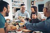 Extended family eating together