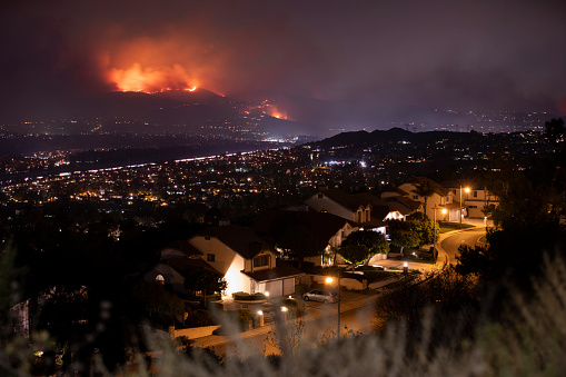 Smoke and flames of the Blue Ridge Fire engulf the hills above Yorba Linda, California, USA.