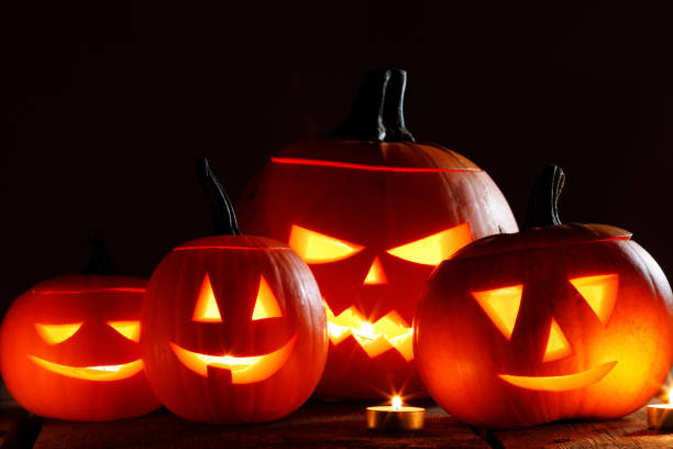 istock Halloween pumpkins and candles 1282430174