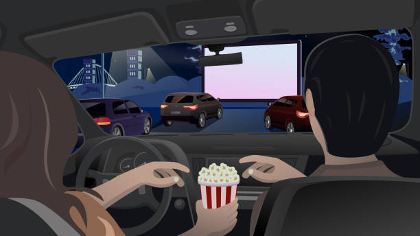 Man and woman are eating popcorn in the car and watching a movie on a big screen in a car cinema. Evening entertainment for lovers in the city in the parking lot. Vector Man and woman are eating popcorn in the car and watching a movie on a big screen in a car cinema. Evening entertainment for lovers in the city in the parking lot. Vector. Illustration woman driving car night stock illustrations