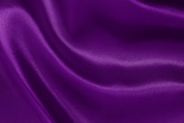 istock Purple fabric cloth texture for background and design art work, beautiful crumpled pattern of silk or linen. 1282432223