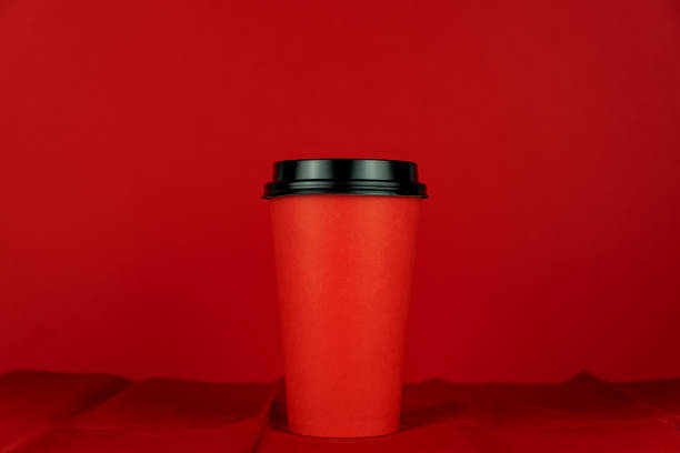 istock Red Cup of take-out coffee on a red background. 1282442436