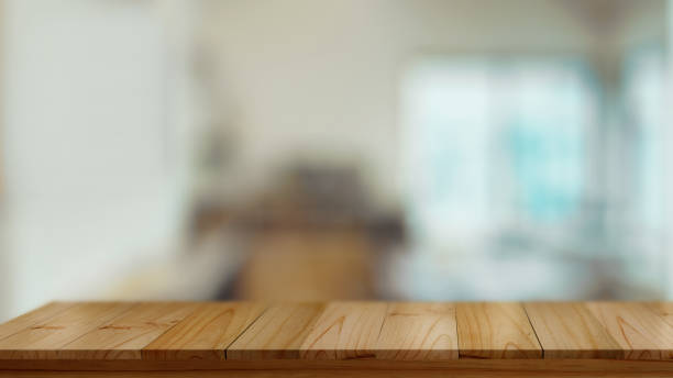 istock Empty wooden table, wooden counter with copy space in blurred background 1282445795