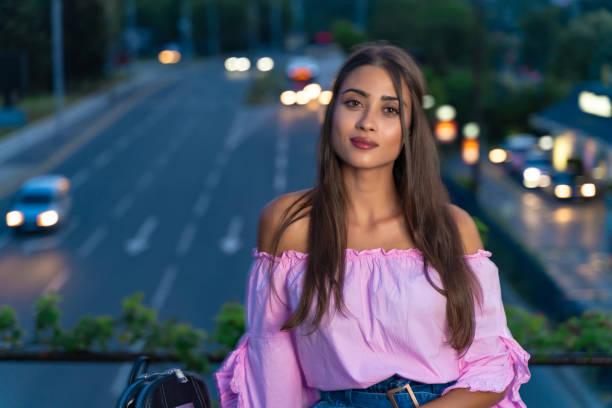 istock Beautiful young girl looking at camera 1282447617