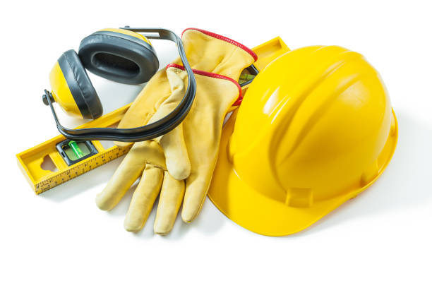 istock construction working tools helmet gloves level earphones isolated on white background 1282447692