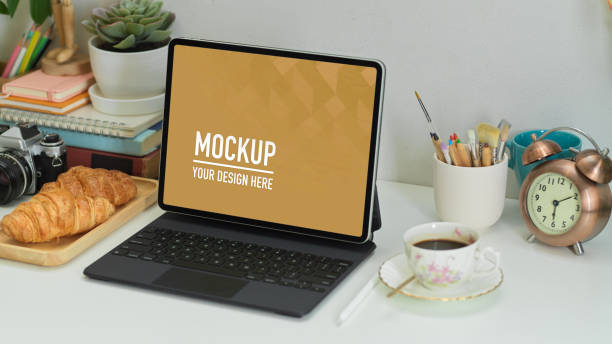 istock Home office with digital tablet, supplies, croissant and coffee, clipping path 1282448105