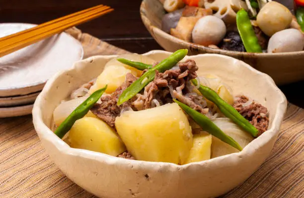 Photo of NikuyagaJapanese cuisine called nikujyaga cooked beef (pork depending on the region), potatoes, onions, carrots etc. with soy sauce, sugar based soup. Popular Japanese food, which means the taste of mothers in Japanese, is called 
