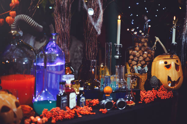 istock glass bottles and candles of Halloween 1282449745