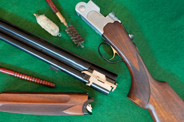 istock Twelve Bore shotgun and cleaning apparatus close-up 1282452019