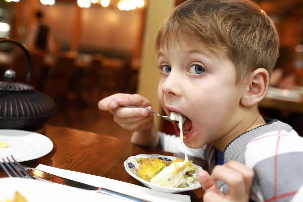 istock Child eating kunefe with ice cream 1282452725