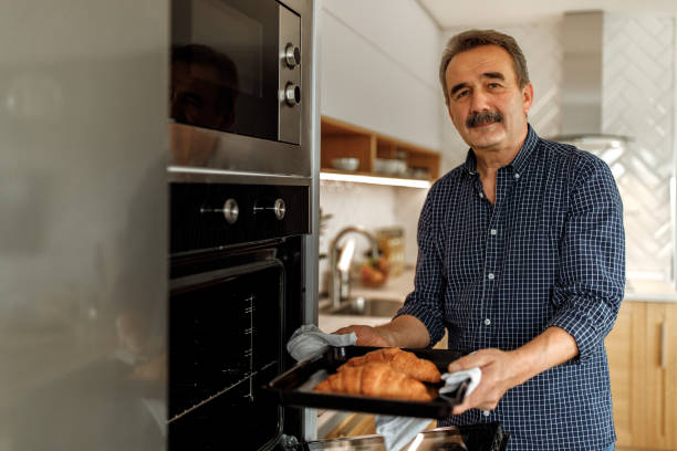istock Making dinner for him and his wife 1282454177