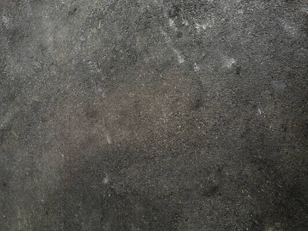 istock Asphalt floor Stone flake black, color rough finish surface road, pavement, walkway texture material background 1282455667