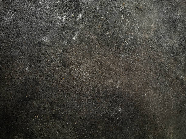 istock Asphalt floor Stone flake black, color rough finish surface road, pavement, walkway texture material background 1282455690