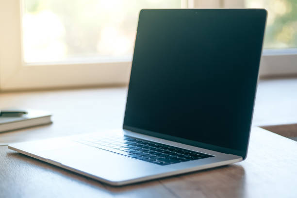 istock close up. modern laptop on the desktop 1282456388