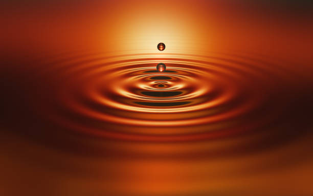 gotas de agua gotas sobre fondo rojo - renderizado 3d - ilustración - ripple concentric wave water fotografías e imágenes de stock