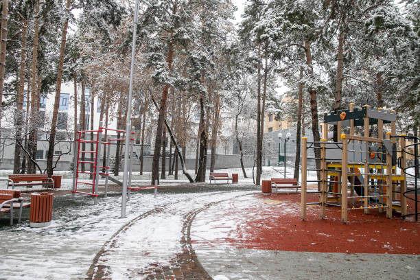 istock Playground under the snow, first snow 1282458502