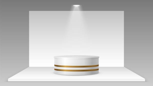 istock Empty stand with light. Realistic pedestal platform mockup, white showroom wall and floor. 3D exhibition expo or business trade pavilion vector illustration 1282460070