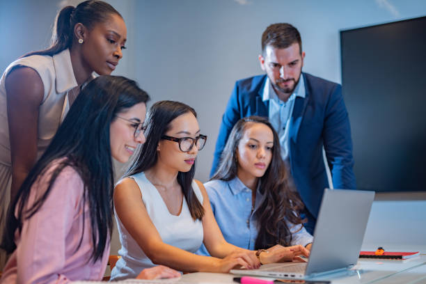 istock Group of people running small business, reading e-mail. 1282460971
