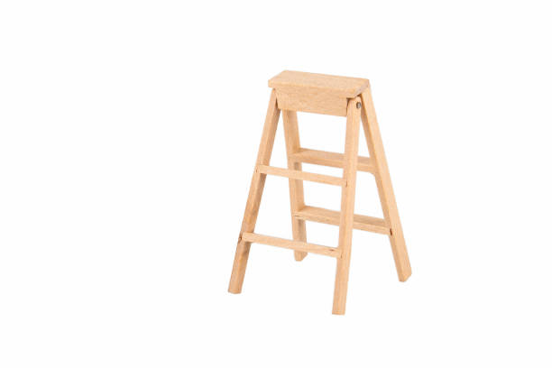 istock Wooden stairs isolated on a white background. Miniature figure 1282462495