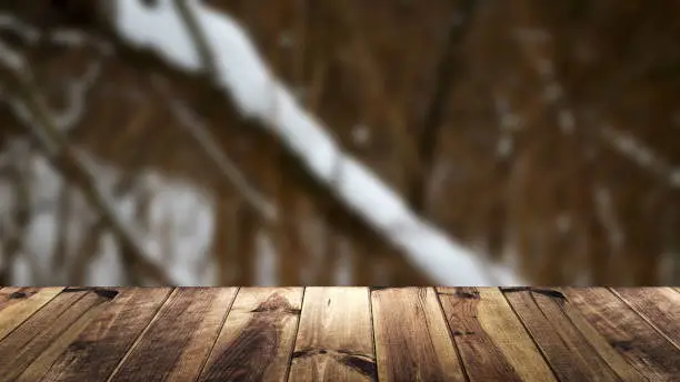 Perspective wood and blur background. Snow composition