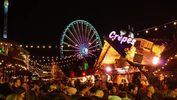 Christmas themed funfair in Hyde Park with attraction rides and a Christmas market. stock photo