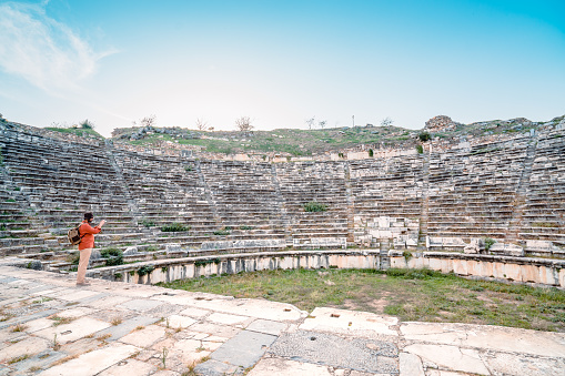 Panoramic view of ancient Greek theater in Antiphellos Ancient City. Antiphellus or Antiphellos known originally as Habesos, was an ancient coastal city in Lycia.