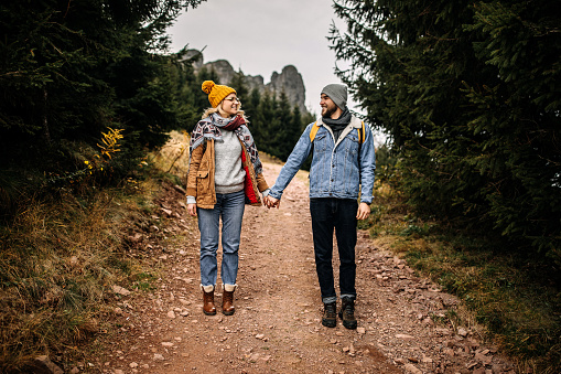 Couple enjoying hike in a forest,