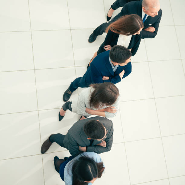 istock group of confident business people standing in a row 1282469103