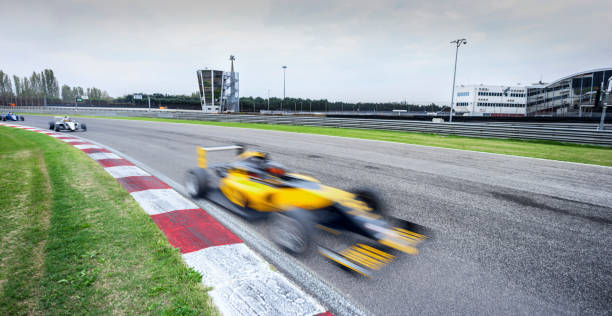 istock Racing cars driving track 1282470490