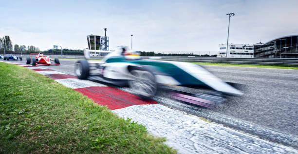 istock Racing cars driving track 1282470510