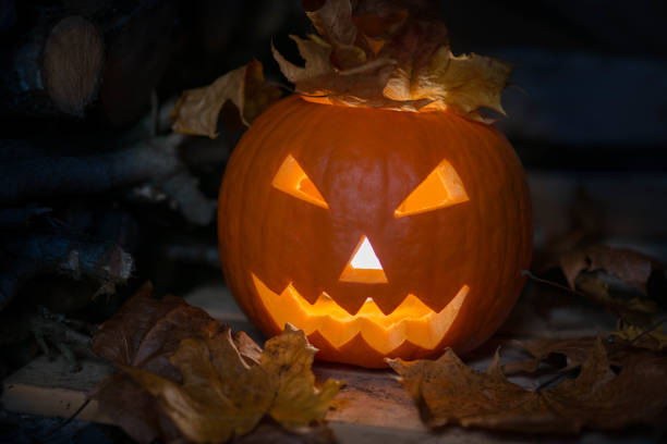 istock Halloween pumpkin angry face in darkness 1282470553