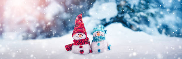 little snowmen on soft snow on blue background - activity baltic countries beauty in nature blue imagens e fotografias de stock