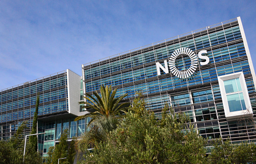 Lisbon, Portugal: NOS building with its leaning facade, headquarters of the Portuguese communications group, control is held by Sonae and Isabel dos Santos - Edifício Campo Grande Rua Actor António Silva.