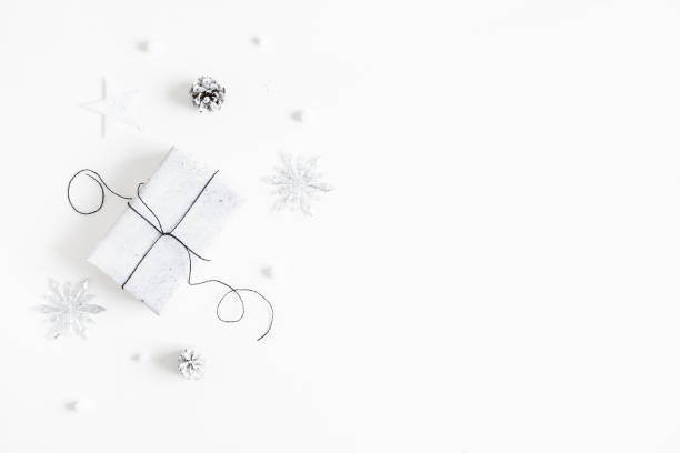 istock Christmas composition. Gift box, silver decorations on white background. Christmas, winter, new year concept. Flat lay, top view, copy space 1282477042